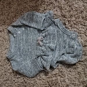 Long sleeved onesie with ruffle